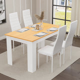 Dining table set of 4 with pine top and white legs, paired with white padded chairs. Sleek and modern design.