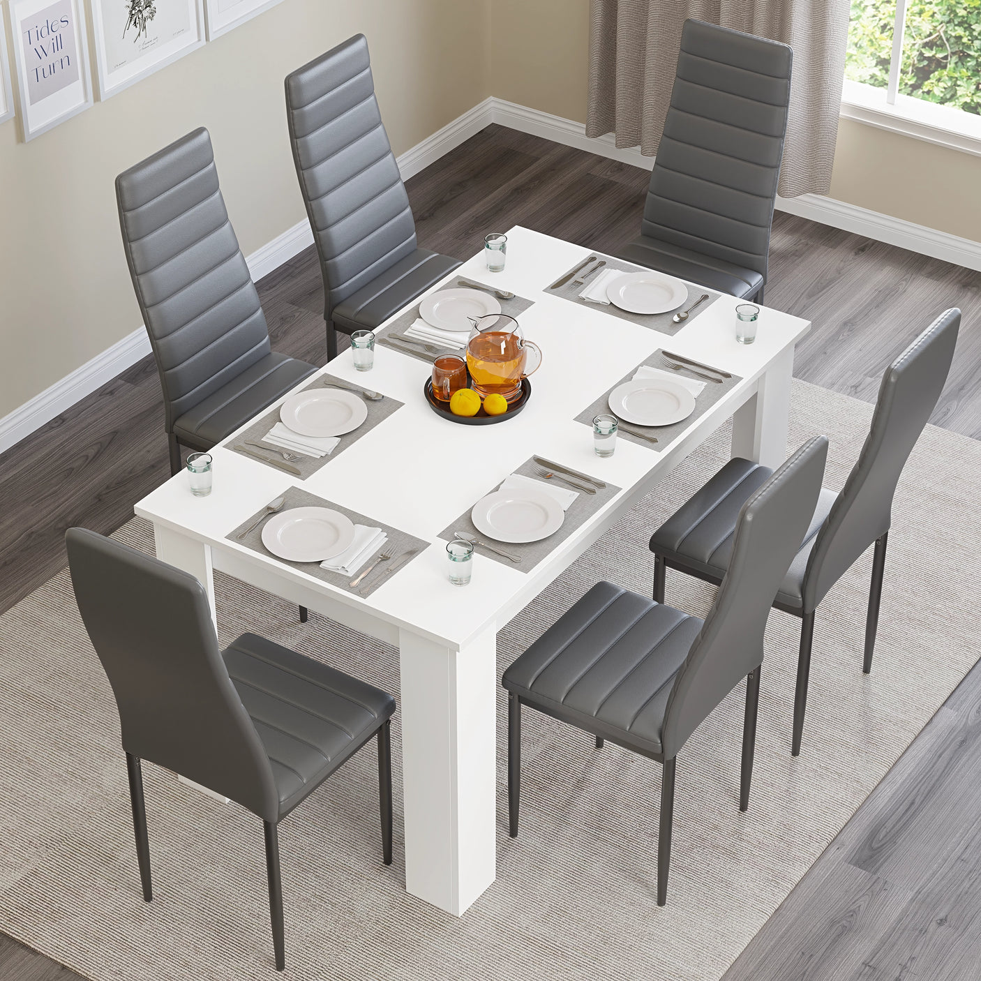 Top view of white dining table with grey padded chairs, ideal for stylish and functional 6 seater dining arrangements.