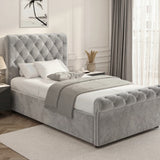 Chesterfield Ottoman Storage Bed in light grey velvet with side lift design, elegant tufted upholstery and hidden storage solution.