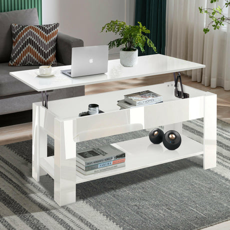 White lift-up coffee table with storage and reflective surface, featuring a laptop, and books.