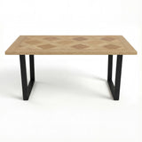 Aldridge rectangular dining table with a geometric wood design and black metal legs. Elegant and modern for any dining room.