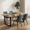 [4 Seater | Grey] Aldridge dining table with candles, cups and wine glasses on top and 4 grey upholstered chairs in a warm and stylish setting.