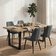 [4 Seater | Grey] Aldridge dining table seats 4 grey ribbed chairs on jute rug with table set for dinner.