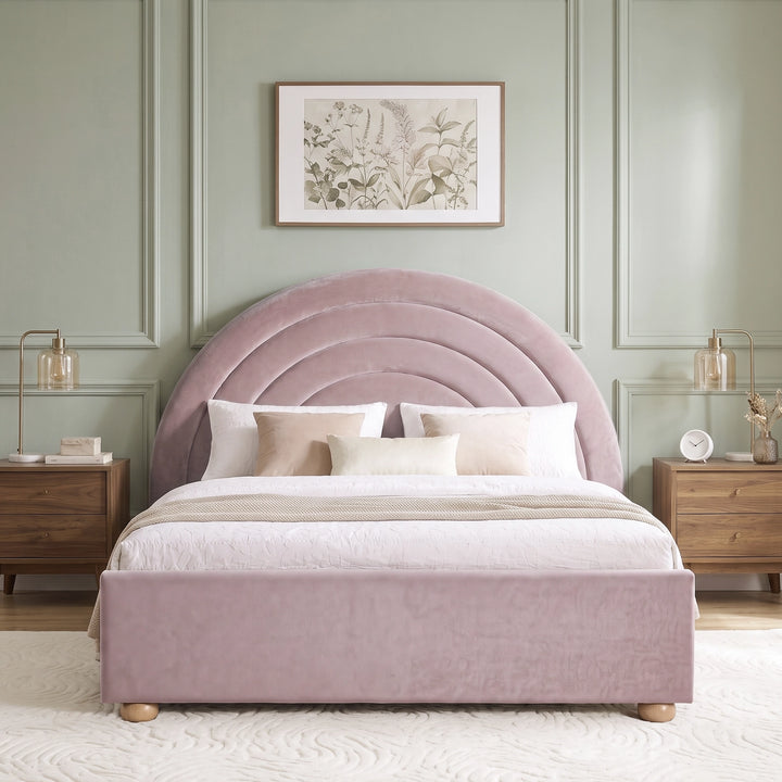 [Pink | King] Front view of pink plush velvet rainbow ottoman bed with concentric arch headboard and wooden feet