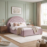 [Pink | King] Wide bedroom view of pink rainbow ottoman bed with curved headboard, rug, side tables and window