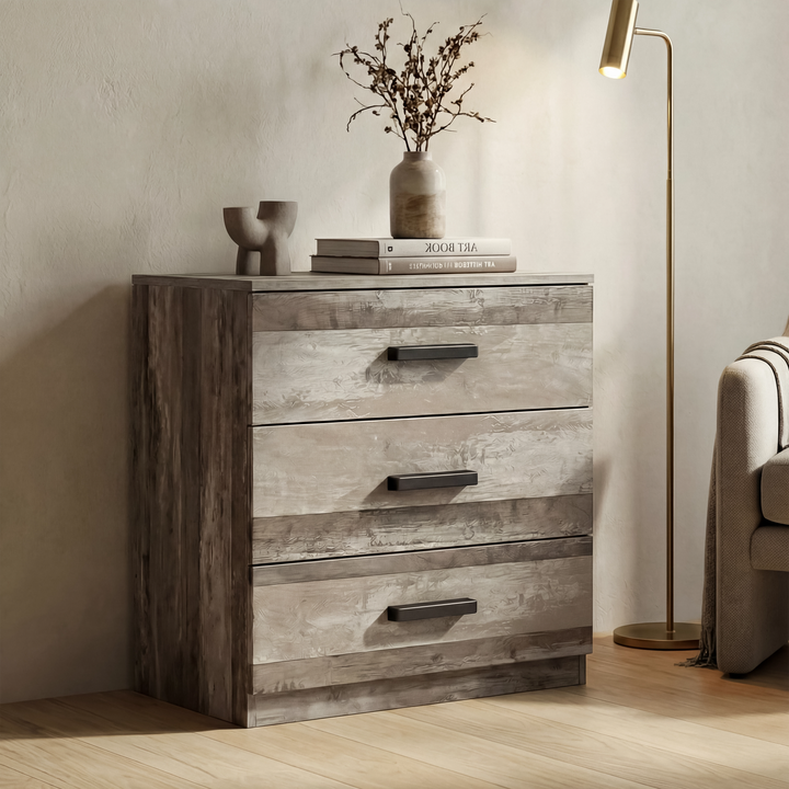 [Ash Grey] three drawer chest positioned in room with textured finish and black wooden bar handles