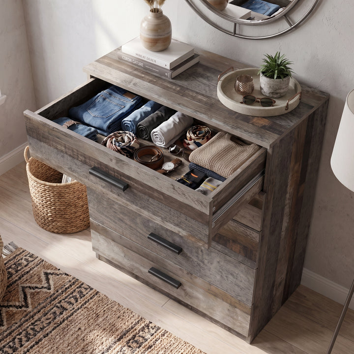 [Ash Grey] Top drawer of the Ash Grey Tall 5 Drawer Chest opened showing organized storage.