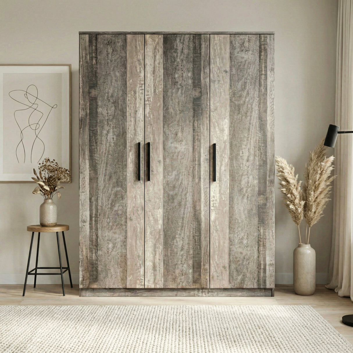 [Ash Grey]  triple door wardrobe front elevation with vertical black handles placed against a wall in a modern room