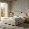 [Double | Beige] Modern bedroom with a large bed, side tables, and a window.