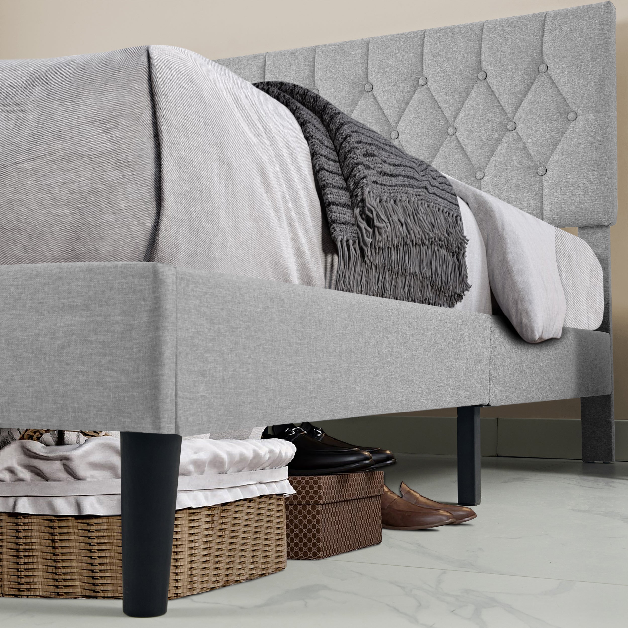 Bed frame luxury with tufted headboard and underbed storage space for shoes and baskets.