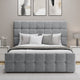 Bed with ottoman storage in light grey, featuring a cushion, mattress, and cozy quilt.