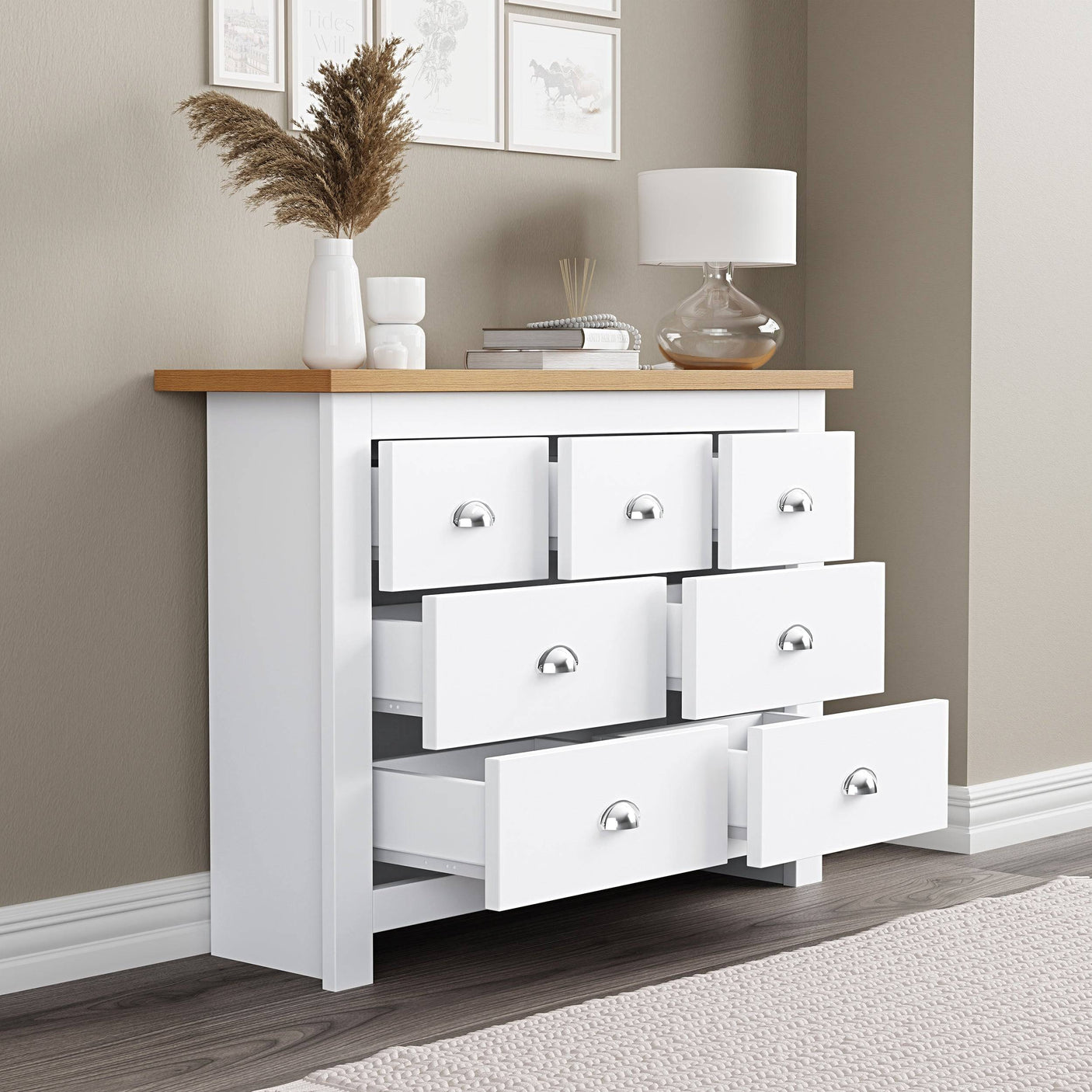 Bedroom chest of drawers furniture with open drawers, offering spacious storage for clothes.
