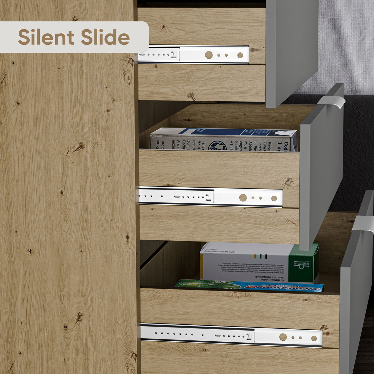 Bedroom chest of drawers modern unit in a two-tone finish with partially open drawers showing smooth runner mechanism