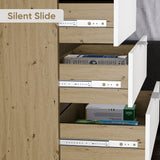 Skova bedroom chest of drawers in a two-tone finish with partially open drawers showing smooth runner mechanism