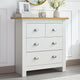 Bedroom chest of drawers with handles, providing convenient storage for clothes and accessories.
