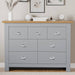 Bedroom furniture chest of drawers with top surface for flower pots, offering storage and decor.
