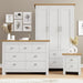 White shaker-style 3 piece bedroom furniture set with oak-effect tops, including wardrobe, drawers and table