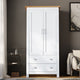 Bedroom furniture wardrobes in white with handles and ample storage space.
