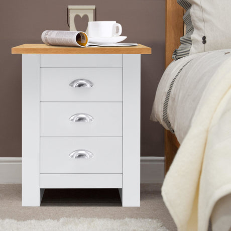 White bedside table with oak top and handles, combining style and functionality for your bedroom.