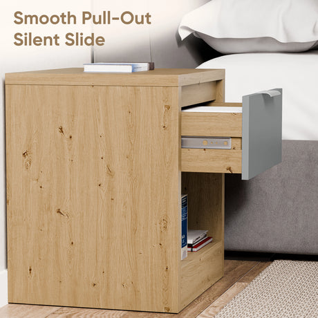 Contemporary bedside table with drawer placed near a bed showing smooth sliding mechanism of the drawers