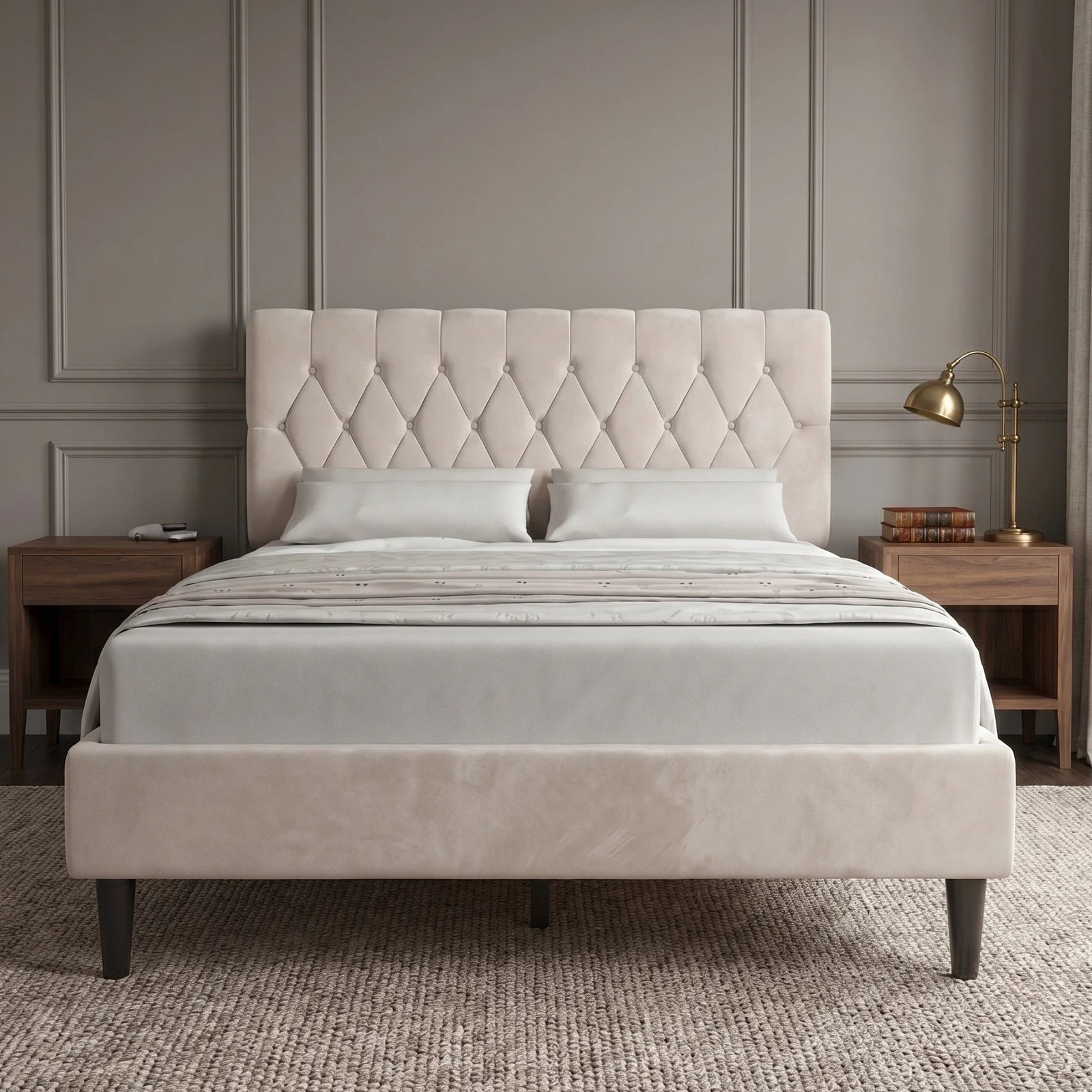 [Double | Beige] Velvet Chesterfield bed in a styled bedroom with dark panelled wall and bedside lamps