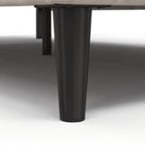 [Double | Beige] Velvet bed frame close-up of dark tapered wooden leg showing base support and clearance