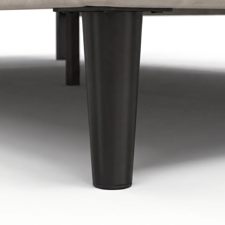 [King | Beige] Velvet bed frame close-up of dark tapered wooden leg showing base support and clearance