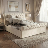 [Double | Beige] Chesterfield Ottoman Bed open storage base showing folded linens, deep-buttoned sleigh frame in cream velvet