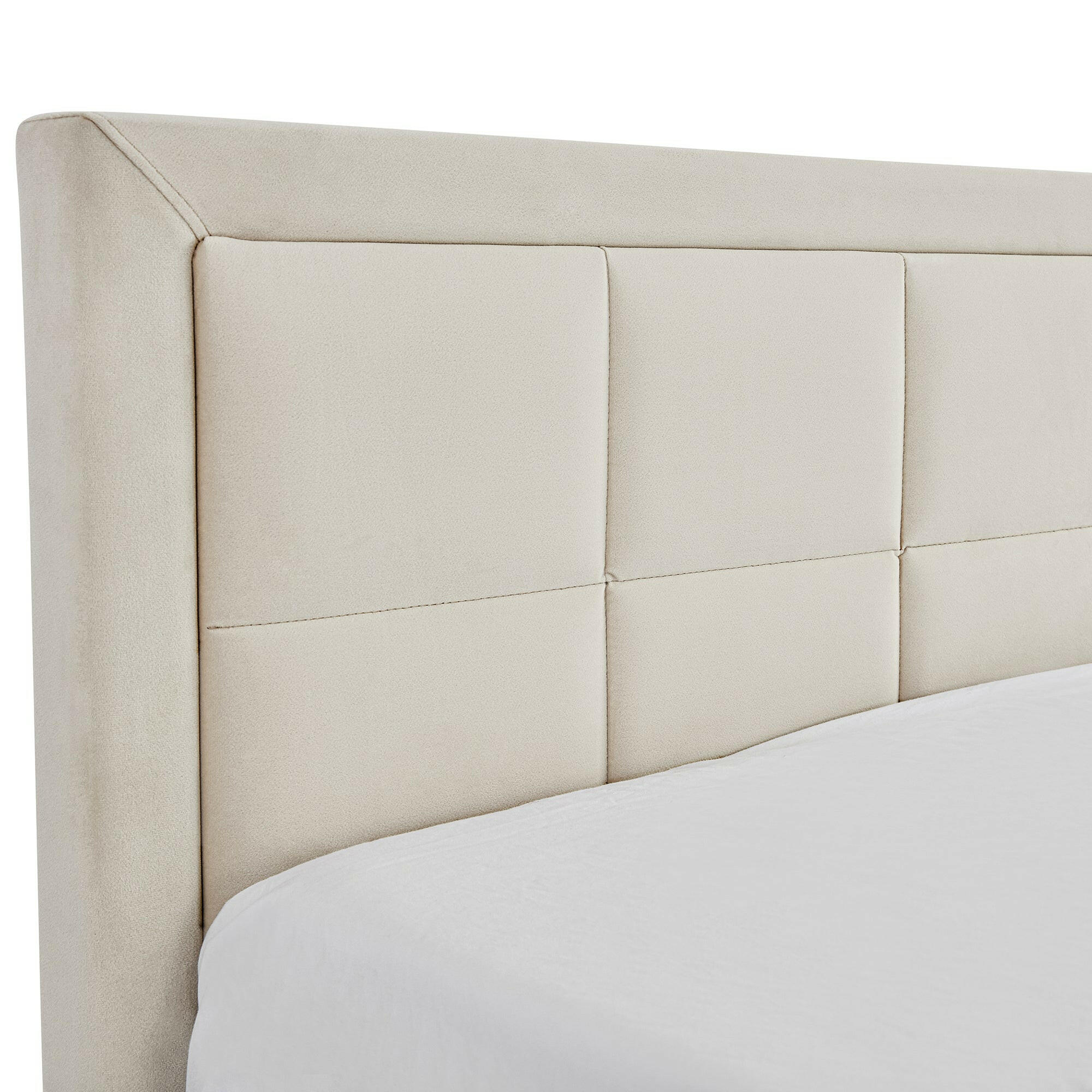 Beige upholstered headboard with a modern panel design, adding elegance to any bedroom decor.