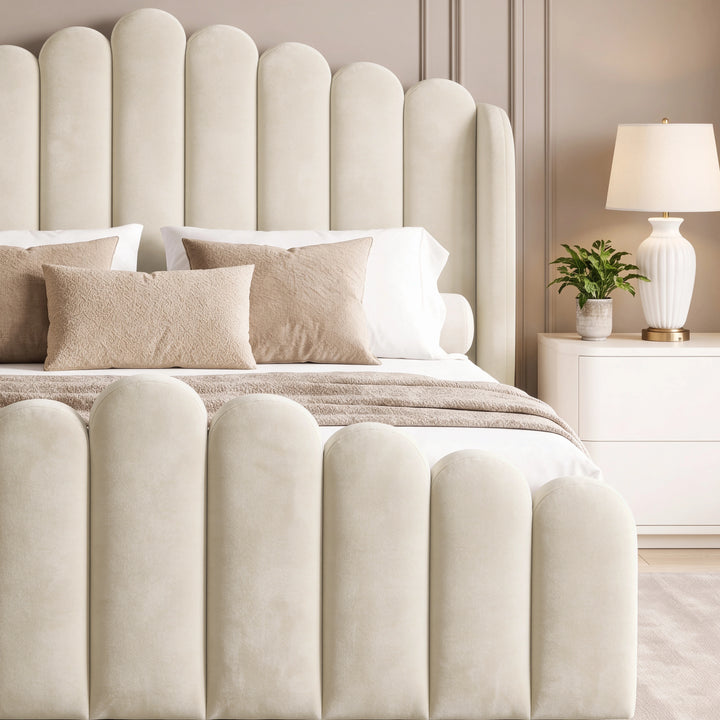 [Double | Beige] Close-up of scalloped velvet footboard and headboard with cushions and bedside lamp