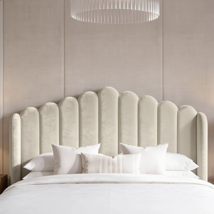 [Double | Beige] Front detail of tall scalloped velvet headboard with rounded vertical channels and padded wings