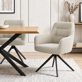 [Beige | Set of 2] Two boucle swivel dining chairs beside a pale wood table, featuring stitched backs, armrests & black base.