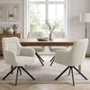 [Beige | Set of 4] Four swivel dining room chairs around a pale wood table styled with a bowl & vase in a bright dining room.