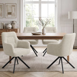 [Beige | Set of 4] Four swivel dining room chairs around a pale wood table styled with a bowl & vase in a bright dining room.