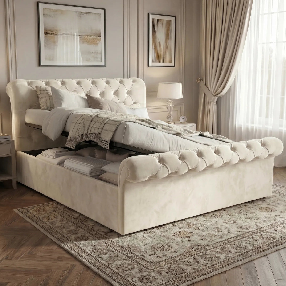 [King | Beige] Chesterfield Ottoman Bed with gas-lift base open, showing spacious under-bed storage holding folded linen