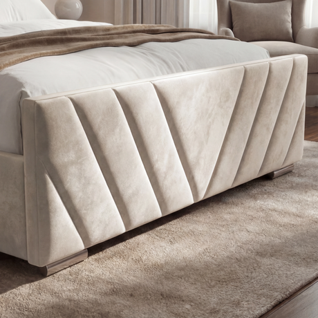 Corner view of the beige ottoman king-size bed frame, emphasizing the fabric texture and sleek design