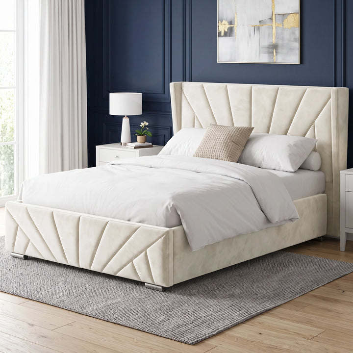 [Double | Beige] Angled view of the Sunrise Double Ottoman Storage Bed Frame Beige Velvet styled on a grey rug.