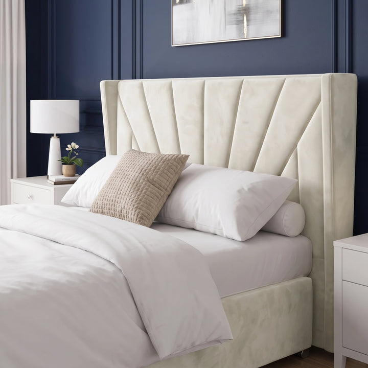 [Double | Beige] Close-up view of the sunburst winged headboard on the Sunrise Double Ottoman Storage Bed Frame Beige Velvet.