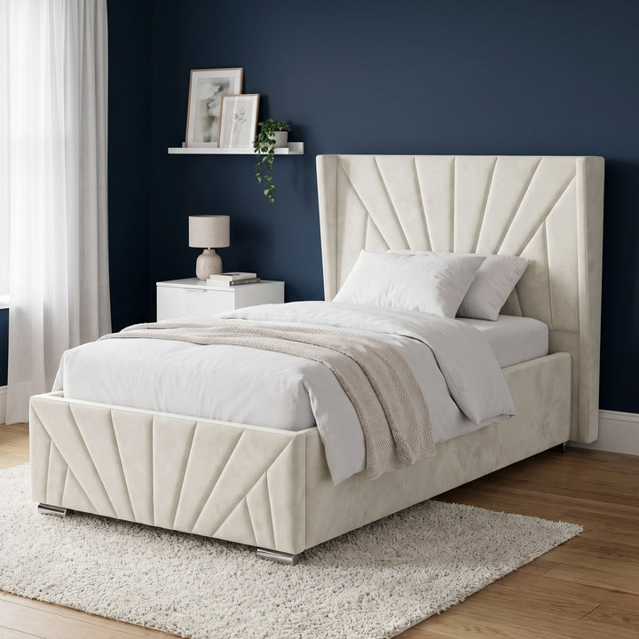 [Single | Beige] Sunrise Single Ottoman Storage Bed Frame Beige Velvet styled in a modern bedroom setting with navy walls.