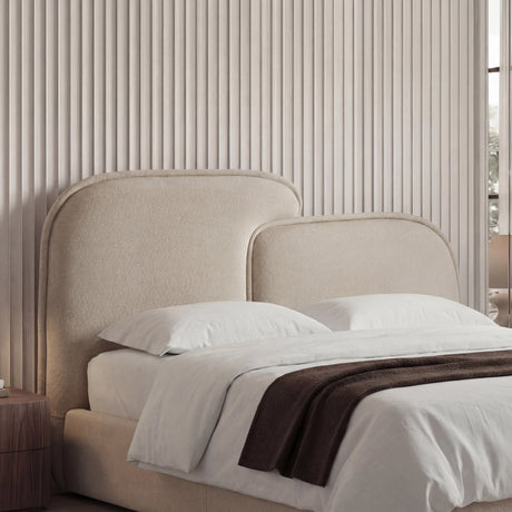 Close-up of softly contoured corner upholstery with visible beige texture and smooth stitching lines