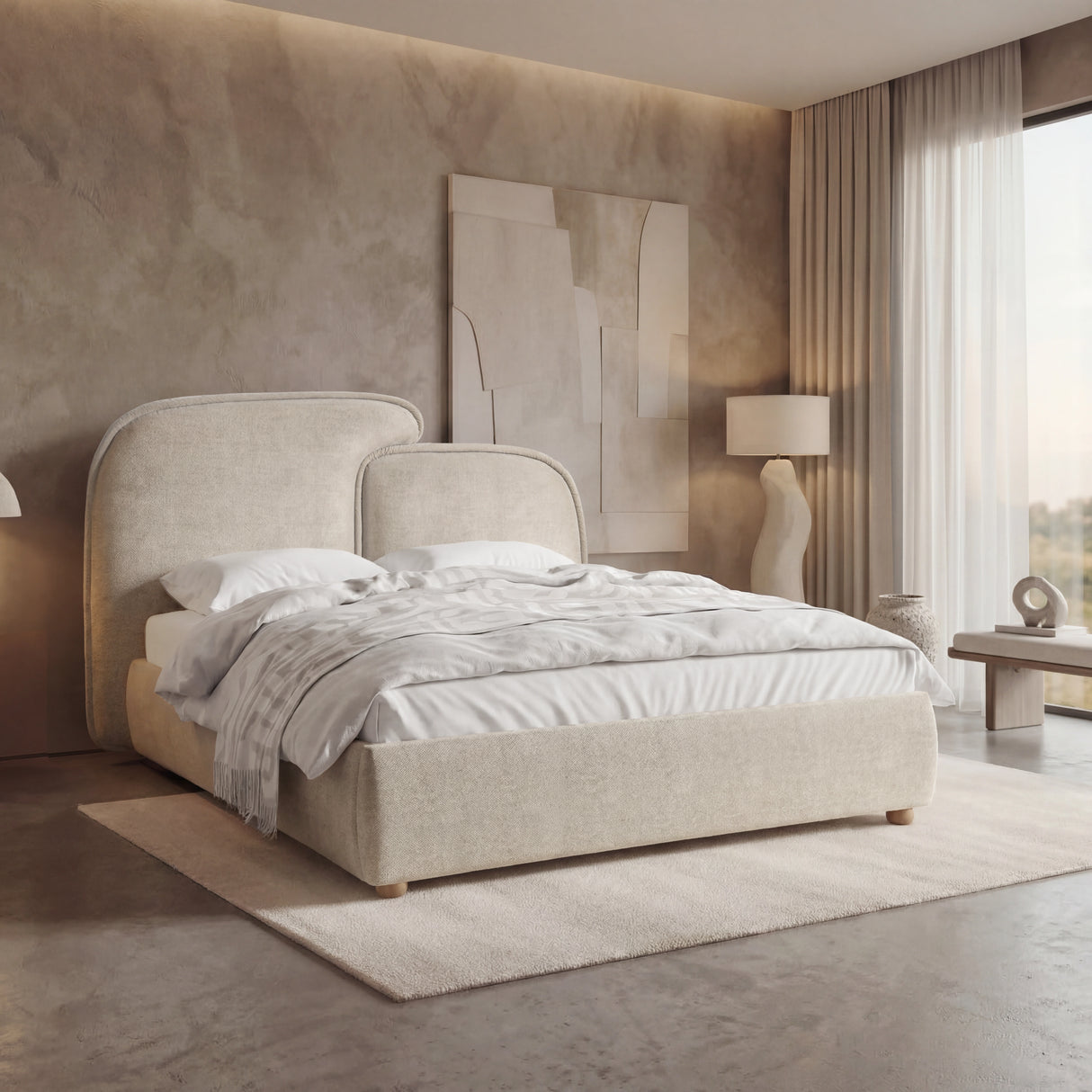 [King | Beige] Side-angle view of a beige fabric double bed, highlighting the low-profile base and soft upholstered frame