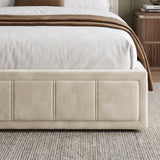 [Double | Beige] upholstered bed frame in a beige tone, shown with white bedding and a brown throw blanket in a styled bedroom setting.