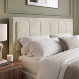 [Double | Beige] Padded headboard of velvet end lift ottoman bed shown close, framed by cushions on the mattress