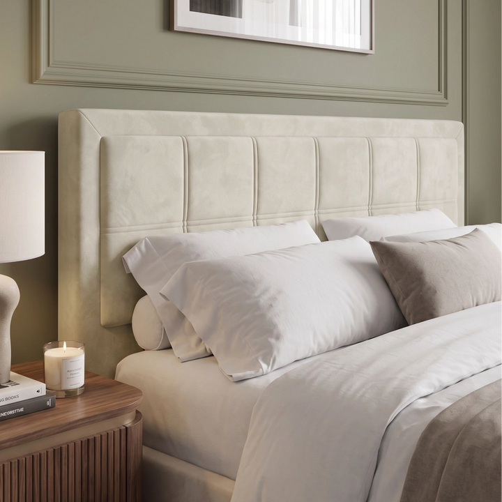 [Double | Beige] Padded headboard of velvet end lift ottoman bed shown close, framed by cushions on the mattress