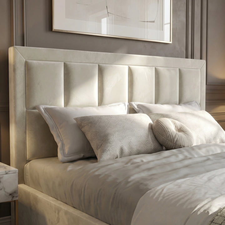 [Double | Beige] Padded headboard of velvet end lift ottoman bed shown close, framed by cushions on the mattress