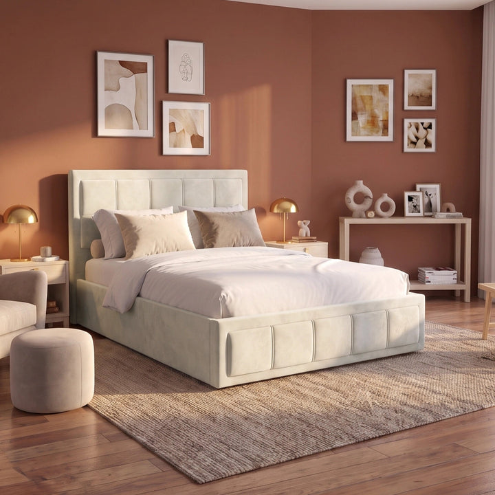 [Small Double | Beige] upholstered platform bed with a tufted headboard and matching footboard, styled in a modern bedroom with warm brown walls, wood flooring, bedside tables, lamps, and framed wall art.