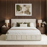 [King | Beige] Front-on view of velvet ottoman storage bed centred between bedside lamps under framed wall art