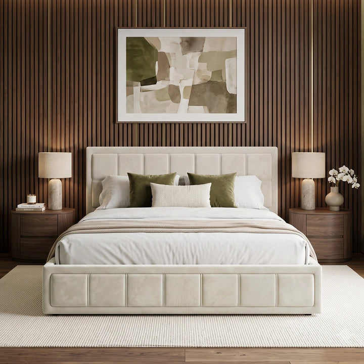 [King | Beige] Front-on view of velvet ottoman storage bed centred between bedside lamps under framed wall art
