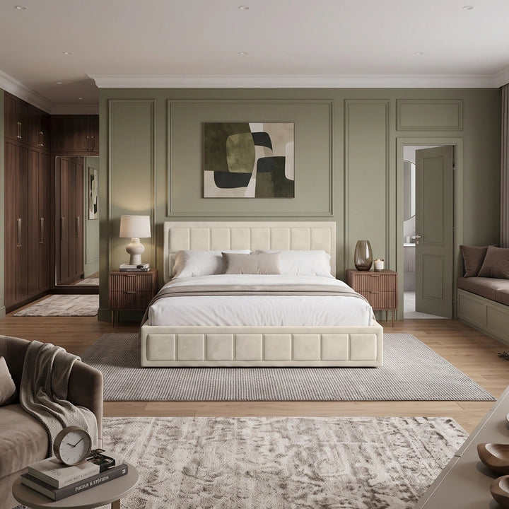 [Super King | Beige] A modern, elegant bedroom featuring sage green paneled walls, a cream tufted bed frame, white bedding, a textured gray rug, and a matching brown armchair in the foreground.