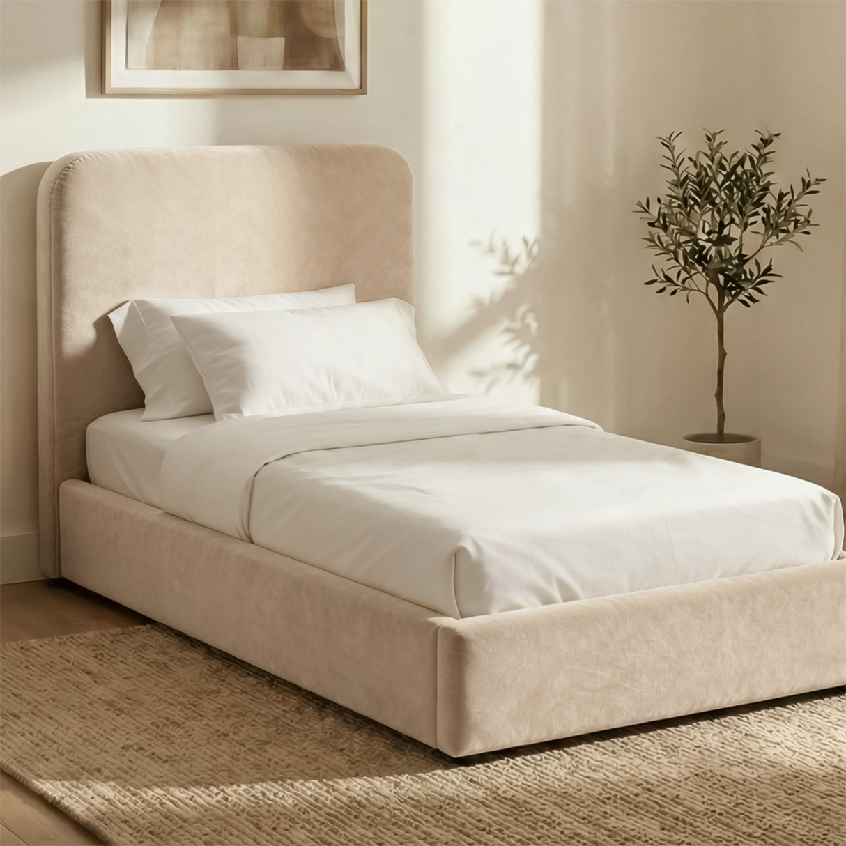 Beige velvet single ottoman storage bed with curved upholstered headboard displayed in styled room with neutral decor